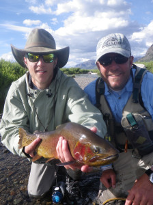 Zack holding his 4-5 lb cutthroat, caught during the cutthroat spawning season in June of 2013 with Feathered Hook.